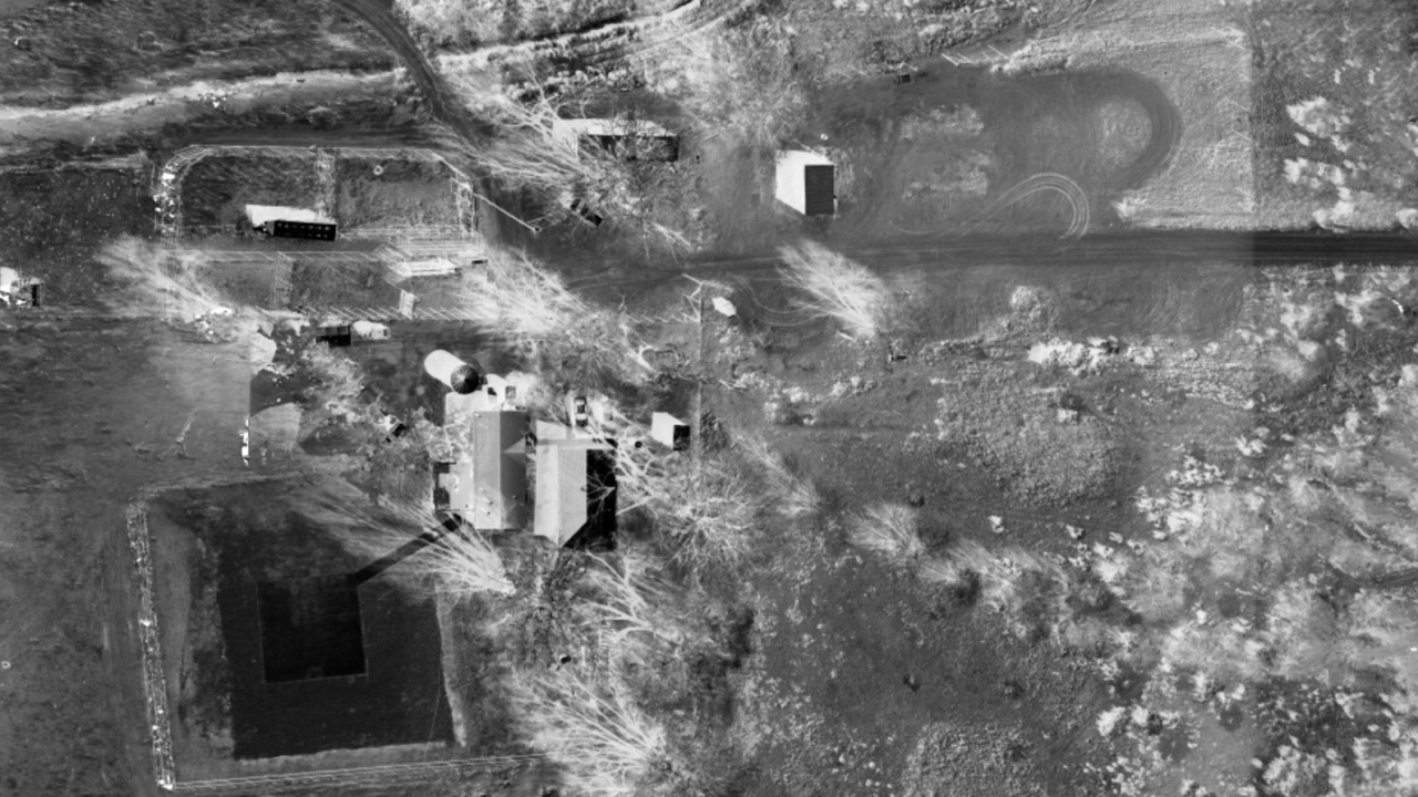Aerial view of buildings and roads in a rural area